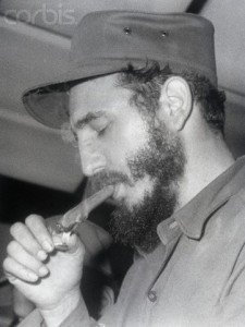 Fidel Castro Lighting a Cigar