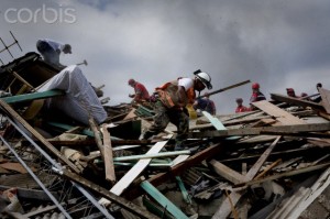 Haiti - Earthquake - Caritas Haiti Rescues Elderly Woman from Fallen Cathedral