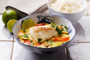 Cod with vegetables and coconut milk and a side of rice (Asia)