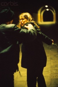 A young woman who is feeling attacked from a man, subway