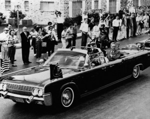 John Fitzgerald Kennedy Riding in a Limousine