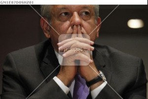 Lopez Obrador, presidential candidate for the Party of the Democratic Revolution, looks on during a news conference in Mexico city