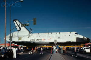Space Shuttle Moving Through Town