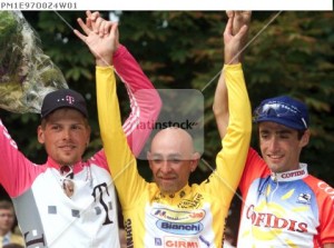 File picture of Tour de France winner Pantani, second placed Ullrich and  third placed Julich celebrate on the podium following final stage of the Tour de France cycling race of the Tour de France cycling race
