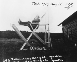 Alexander Graham Bell sitting in tetrahedral chair