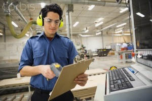 Worker scanning document in warehouse