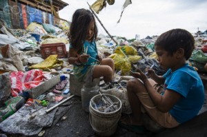 Children recycling plastic