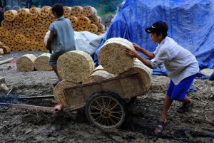 Boy working in chopstick factory in North Vietnam,South East Asia,Asia