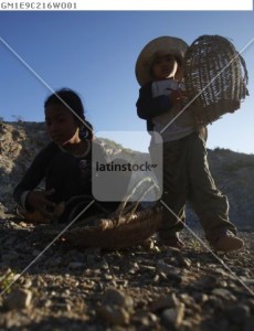 Young girls collect mountain rock for sale at a Cheung Chhnok mountain in Kompong Cham