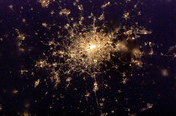 An undated hand out photograph taken by the crew of the International Space Station received on February 27, 2003 shows a nigt-time view of London. The picture was taken with a digital camera as the crew raced through space at 17,000 miles per hour (27, 353 kph) and shows a clear view of some of London's landmarks including the River Thames snaking through the city's heart and the M25 motorway which encircles the capital. EDITORIAL USE ONLY REUTERS/HO MD/JV