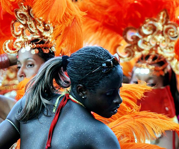 A reveler dances during Carnival in Port of Spain's Queen's Park Savannah in Trinidad and Tobago. Photo by Jorge Silva