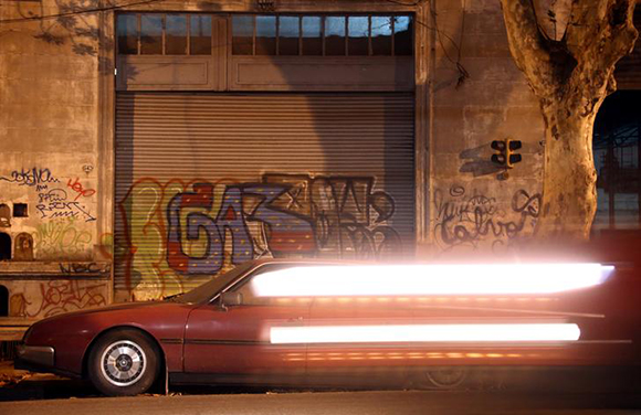 A car passes by a 1980's Citroen GSA Pallas parked on a street in Buenos Aires, Argentina, May 26, 2017. Picture taken May 26, 2017. REUTERS/Marcos Brindicci