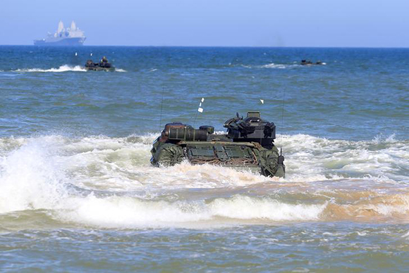 A U.S. navy amphibious assault vehicle enters the sea during annual recurring multinational, maritime-focused NATO exercise BALTOPS 2017, near Ventspils, Latvia, June 6, 2017. REUTERS/Ints Kalnins