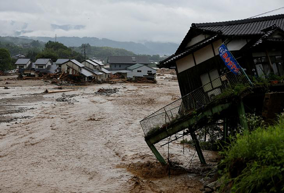 Destroyed houses are seen at an area hit by heavy rain at Haki district in Asakura, Fukuoka Prefecture, Japan July 7, 2017. Photo by Issei Kato