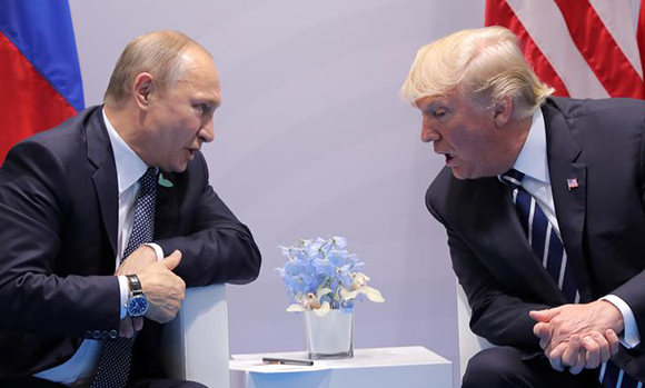 U.S. President Donald Trump speaks with Russian President Vladimir Putin during the their bilateral meeting at the G20 summit in Hamburg, Germany July 7, 2017. Photo by Carlos Barria