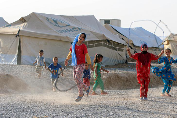 Displaced children play with ropes in Hassan Sham camp, east of Mosul, Iraq July 7,2017. Picture taken July 7, 2017. Photo by Alaa Al-Marjani