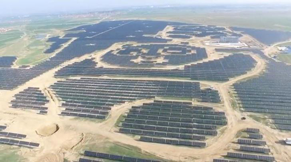  An aerial view shows panda-shaped solar plants built by Panda Green Energy Group in Datong, Shanxi province, China in this still image taken from a video footage, courtesy of Panda Green Energy Group, shot July 21, 2017. Photo by Panda Green Energy Group/Handout 