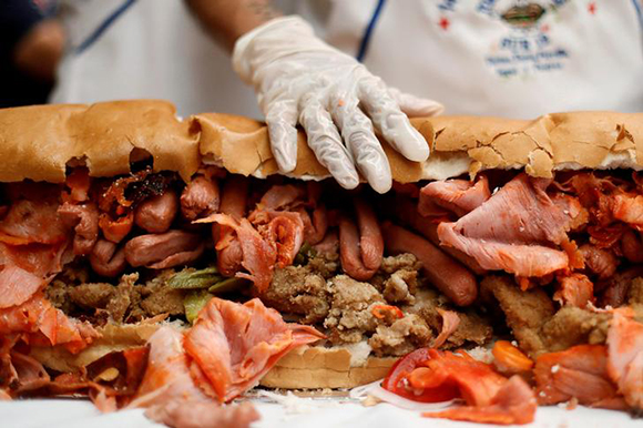  A part of a giant Torta weighing 820 kg and 67-meters long is pictured, during an attempt at the world's biggest sandwich (commonly called a Torta in Mexico), in Mexico City, Mexico. Photo by Edgard Garrido 