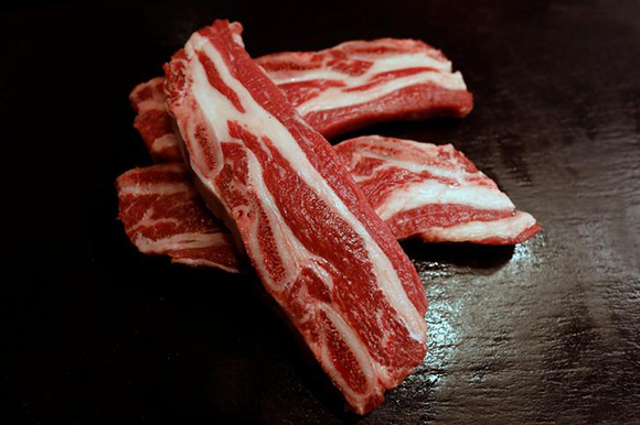  Short ribs, Argentine beef cut, are seen at the Cabana Argentina restaurant in Madrid, Spain. Photo by Juan Medina 