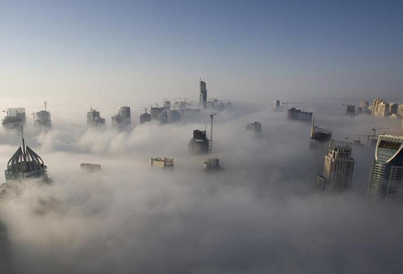 Heavy fog rolls by early in the morning near the Dubai Marina. Photo by Steve Crisp