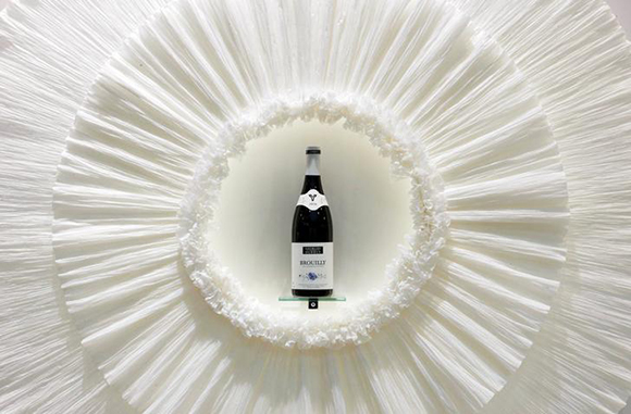 A bottle of Brouilly wine is dispayed at the wine fair Vinexpo in Bordeaux, southwestern France Photo by Regis Duvignau