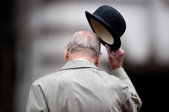 Britain's Prince Philip, in his role as Captain General, Royal Marines, attends a Parade to mark the finale of the 1664 Global Challenge, on the Buckingham Palace Forecourt, in central London, Britain Photo by Hannah McKay