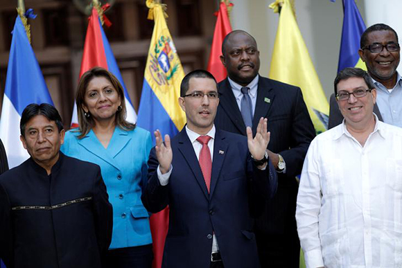Venezuela's Foreign Minister Jorge Arreaza (C), former Bolivian Foreign Minister David Choquehuanca (L) and Cuba's Foreign Minister Bruno Rodriguez (R) pose for a picture during an ALBA-TCP alliance meeting in Caracas, Venezuela August 8, 2017. Photo by Ueslei Marcelino