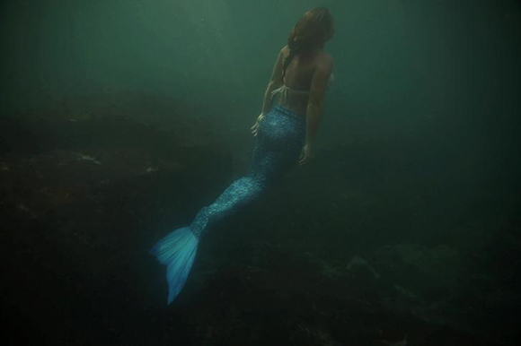 Mermaid and diving instructor Luciana Fuzetti trains whilst wearing a mermaid tail in the Tijucas Islands in Rio de Janeiro, Brazil July 22, 2017. Photo by Pilar Olivares