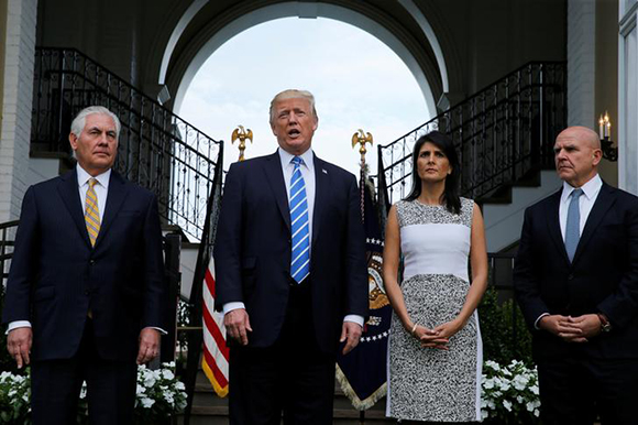 U.S. President Donald Trump speaks to reporters after meeting with Secretary of State Rex Tillerson (L), U.S. Ambassador to the United Nations Nikki Haley (2nd R) and National Security Adviser H.R. McMaster (R) at Trump's golf estate in Bedminster, New Jersey U.S. August 11, 2017. Photo by Jonathan Ernst
