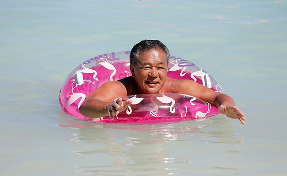 A tourist enjoys the waters off the Tumon Beach on the island of Guam, a U.S. Pacific Territory, August 12, 2017. Photo by Erik De Castro