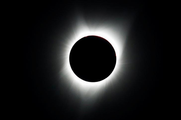 A total solar eclipse is photographed from atop Carroll Rim Trail at Painted Hills, a unit of the John Day Fossil Beds National Monument, near Mitchell, Oregon, U.S. August 21, 2017. Photo by Adrees Latif