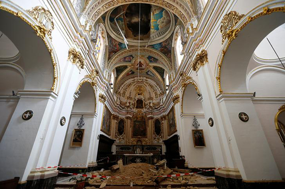 Broken masonry is seen around the altar of the 500-year-old Church of Our Lady of Jesus, one of Malta's oldest churches and a popular tourist attraction, after a section of the ceiling collapsed, in Rabat, Malta, August 23, 2017. Photo by Darrin Zammit Lupi