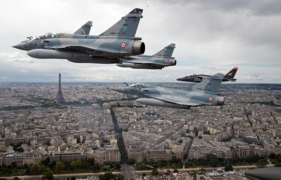 Four Mirage 2000C and one Alpha jet flight over Paris, France, on their way to participate in the Bastille Day military paradePhoto by Philippe Wojazer