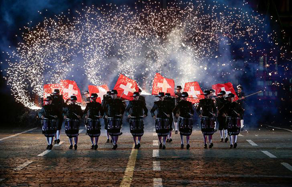 Members of Switzerland's Top Secret Drum Corps perform during the International Military Orchestra Music Festival "Spasskaya Tower" in Red Square in Moscow, Russia. Photo by Andrey Volkov