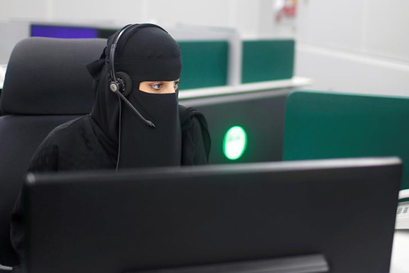 A Saudi woman works inside the first all-female call centre in the kingdom's security sector, in the holy city of Mecca, Saudi Arabia. Photo by Suhaib Salem