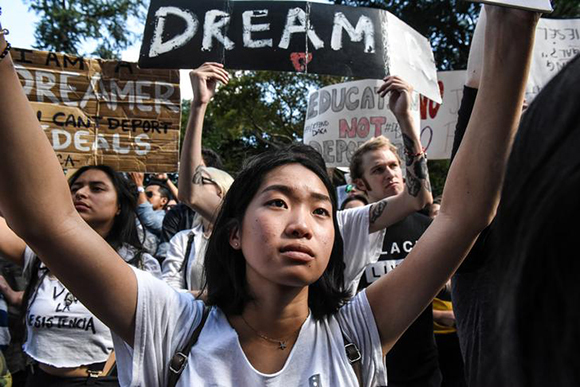 People participate in a protest in defense of the Deferred Action for Childhood Arrivals program or DACA in New York, NY, U.S., September 9, 2017. REUTERS/Stephanie Keith