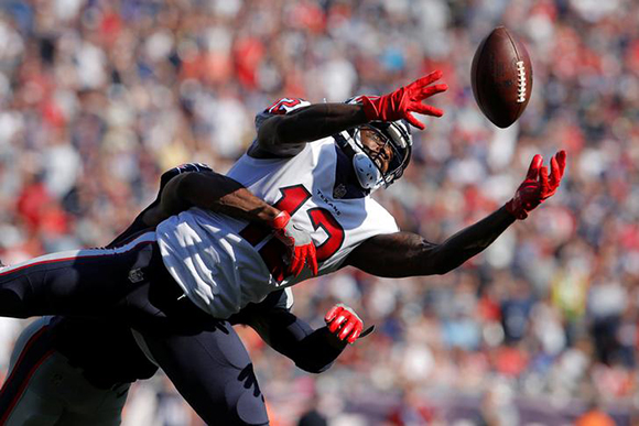  Houston Texans wide receiver Bruce Ellington (12) makes the catch under pressure from the New England Patriots defense in the second half at Gillette Stadium, Foxborough, MA, USA September 24, 2017 Photo by David Butler 