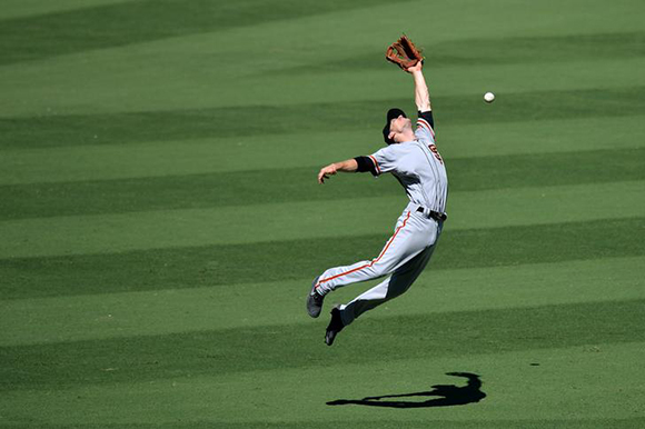  San Francisco Giants second baseman Kelby Tomlinson (37) cannot get to a single by Los Angeles Dodgers right fielder Curtis Granderson (not pictured) during the second inning at Dodger Stadium. Los Angeles, CA, USA, September 24, 20017 Photo by Jake Roth 