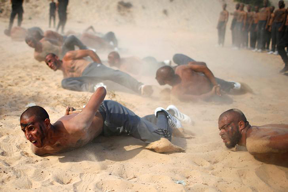  Palestinian Hamas policemen take part in a military training at Hamas-run police academy in Khan Younis in the southern Gaza Strip September 27, 2017. Photo by Suhaib Salem 