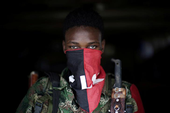 A rebel from Colombia's Marxist National Liberation Army (ELN) poses for a photograph in the northwestern jungles, in Colombia, August 31, 2017. Picture taken August 31, 2017. Photo by Federico Rios