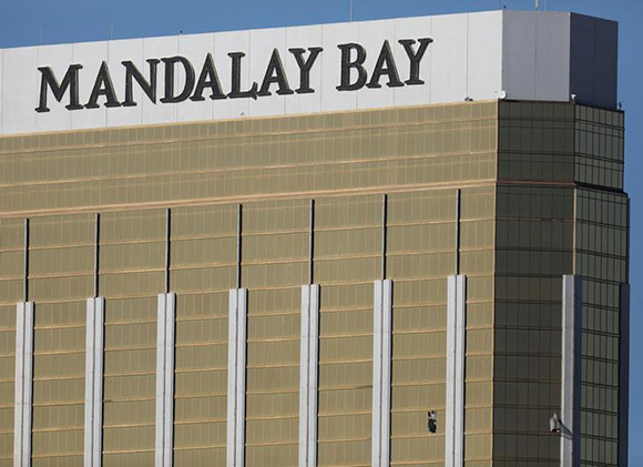 Two broken windows are seen at The Mandalay Bay Resort and Casino following a mass shooting at the Route 91 Festival in Las Vegas, Nevada, U.S., October 2, 2017. Photo by Mike Blake