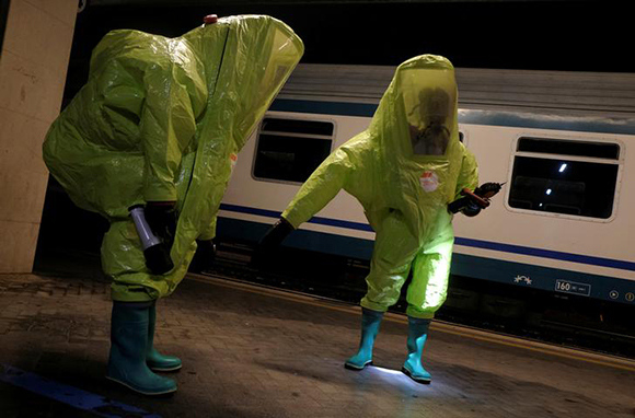 Italian firefighters take part in an anti-terror drill at the Santa Lucia train station in Venice, Italy. Photo by Manuel Silvestri