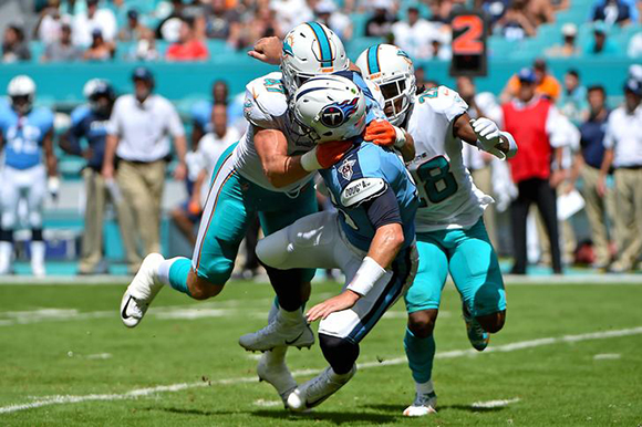 Oct 8, 2017; Miami Gardens, FL, USA; Miami Dolphins middle linebacker Kiko Alonso (47) brings down Tennessee Titans quarterback Matt Cassel (16) after fumbling the ball during the first half at Hard Rock Stadium. Miami Gardens, FL, USA; October 8, 2017. Photo by Jasen Vinlove-USA TODAY Sports