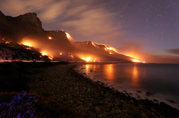  Wildfires burn along the Twelve Apostles area of Table Mountain in Cape Town, South Africa. Photo by Mike Hutchings 