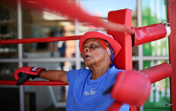  Constance Ngubane, 79 years old, takes part in boxing lessons in an attempt to battle old age with exercise at Cosmo city outside Johannesburg, South Africa. Photo by Siphiwe Sibeko 