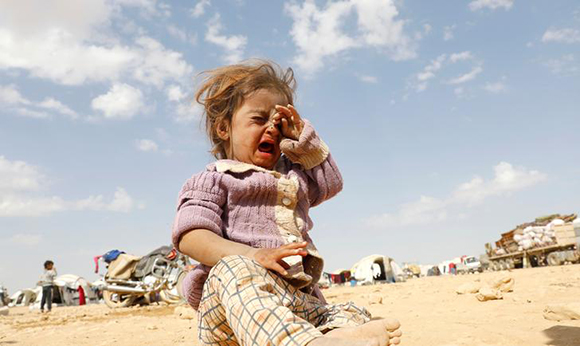  A girl cries at a refugee camp for people displaced in fighting between the Syrian Democratic Forces and Islamic State militants in Ain Issa, Syria October 14, 2017. Photo by Erik De Castro 