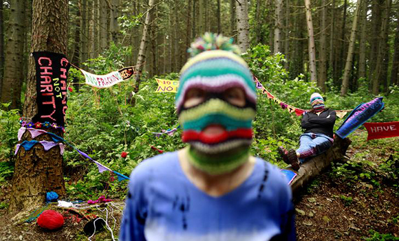 Yarnbombers Purl 1(L) and Knit 1display some of the guerilla knitting and crocheting which they plan to use when they target next week's G8 summit, in the Mourne Mountains, near Newcastle, County Down Photo by Cathal McNaughton 