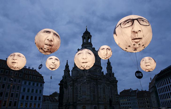  Balloons made by the 'ONE' campaigning organisation depicting leaders of the countries members of the G7 are seen in front of the Frauenkirche cathedra.l Photo by Fabrizio Bensch 