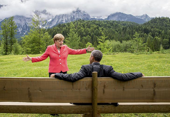  German Chancellor Angela Merkel speaks with U.S. President Barack Obama outside the Elmau castle in Kruen near Garmisch-Partenkirchen, Germany. Photo by Michael Kappeler 