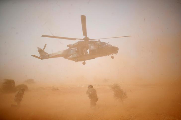  A NH 90 Caiman military helicopter takes-off during the regional anti-insurgent Operation Barkhane in Inaloglog, Mali, October 17, 2017. Photo by Benoit Tessier 